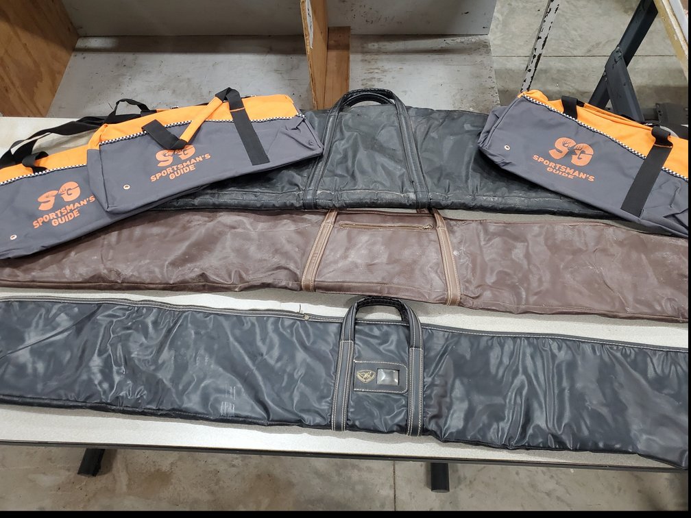 Lot 115: Archery cases and bags