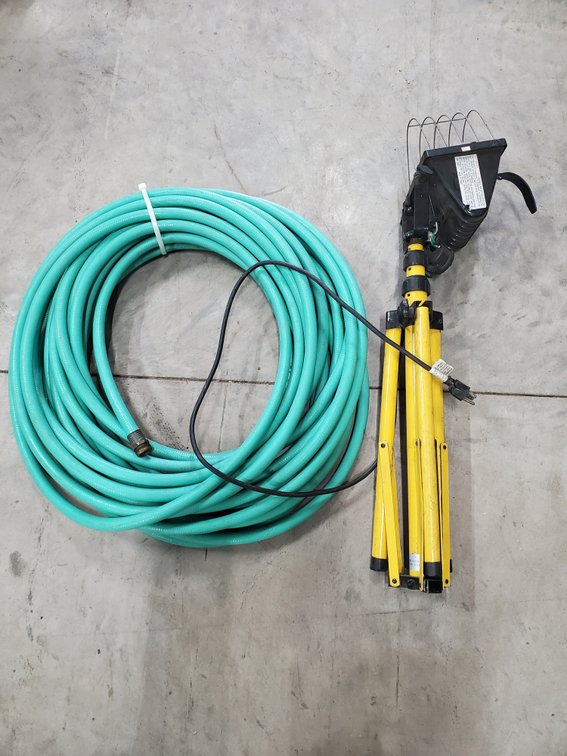 Lot 171: Garden hose and work light
