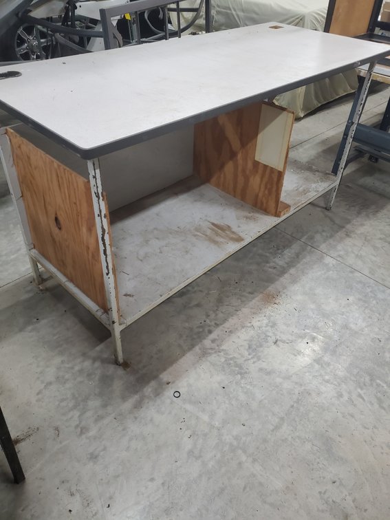 Lot 129: Steel framed Table