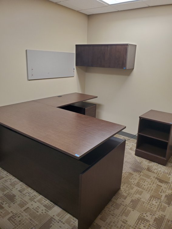 Lot 20: Large power lift office desk with lower and upper cabinets