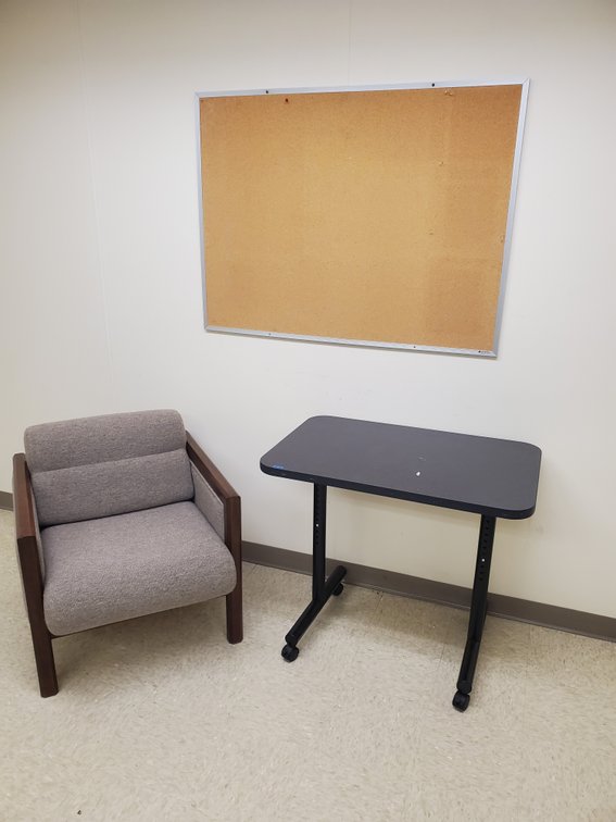 Lot 11: Rolling table,chair and pin board