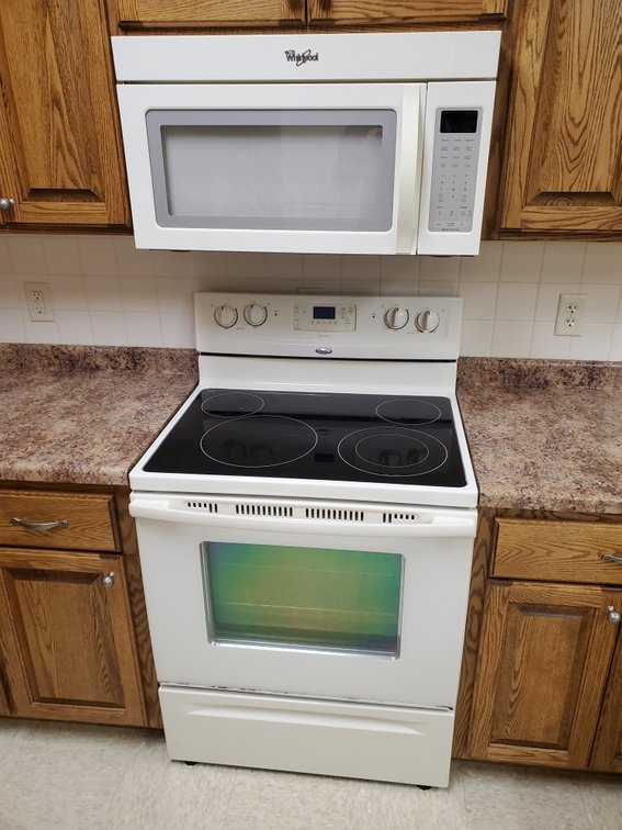 Lot 18: Whirlpool microwave and oven