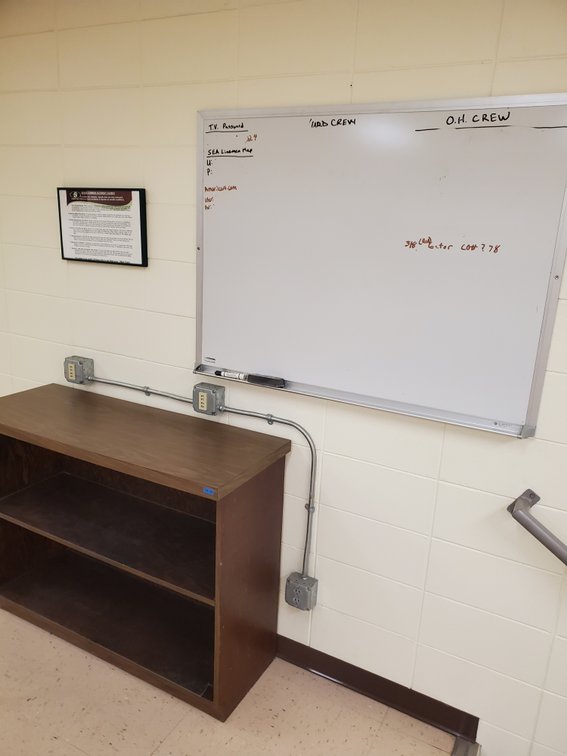 Lot 58: Bookshelf and white board