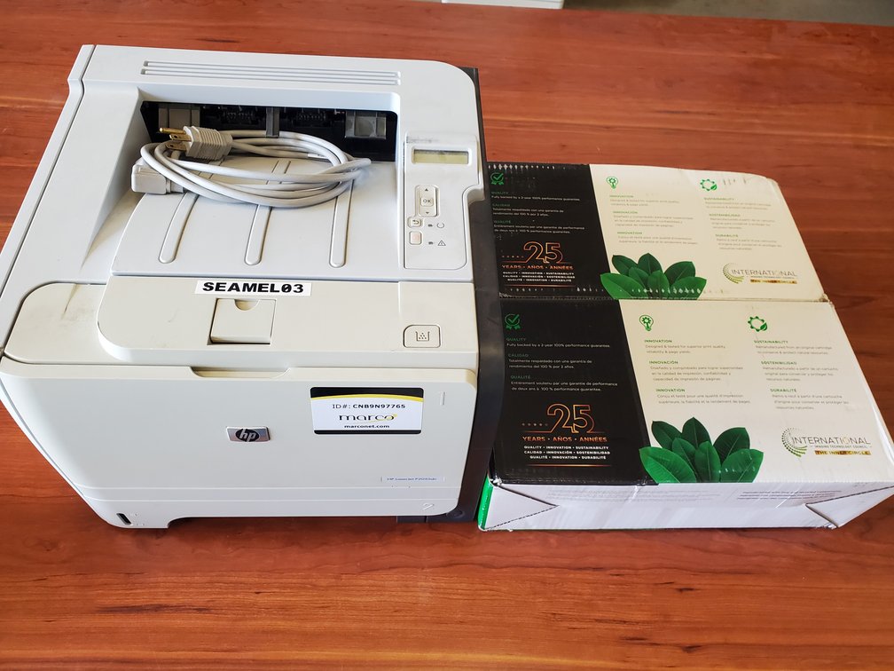 Lot 55: Hp LaserJet printer with 2 new toner cartridges