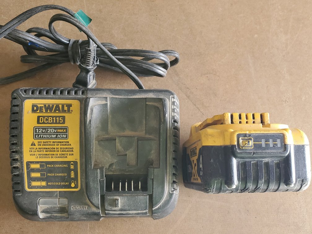 Lot 28: Dewalt 20 volt battery and charger