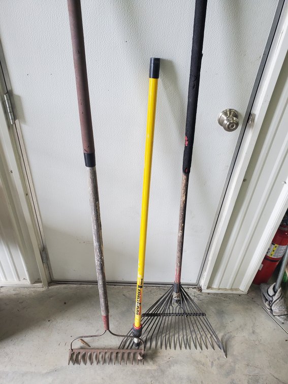 Lot 127: Pair of rakes and adjustable handle