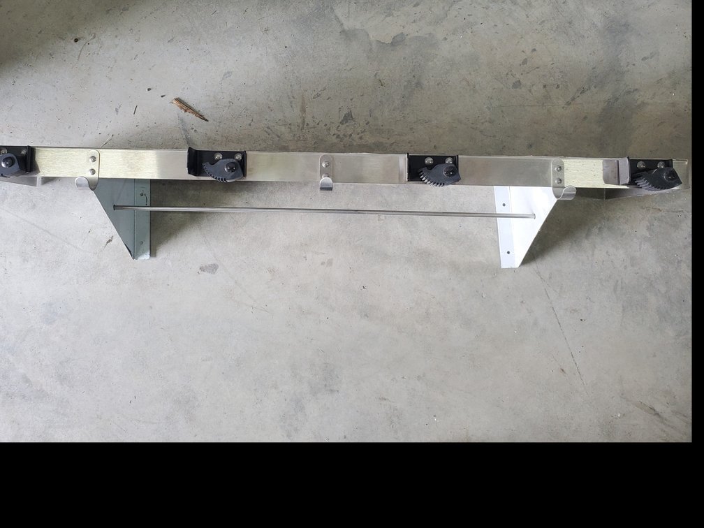 Lot 128: New stainless steel shelf with handle holders