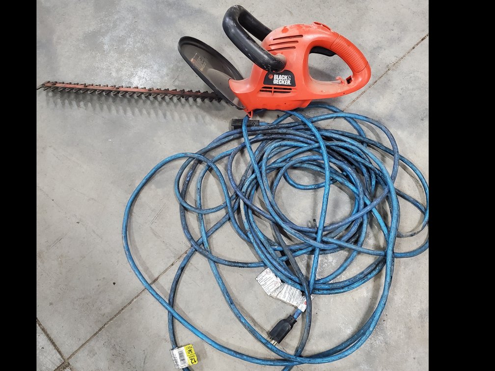 Lot 57: Hedge trimmer and extension cord