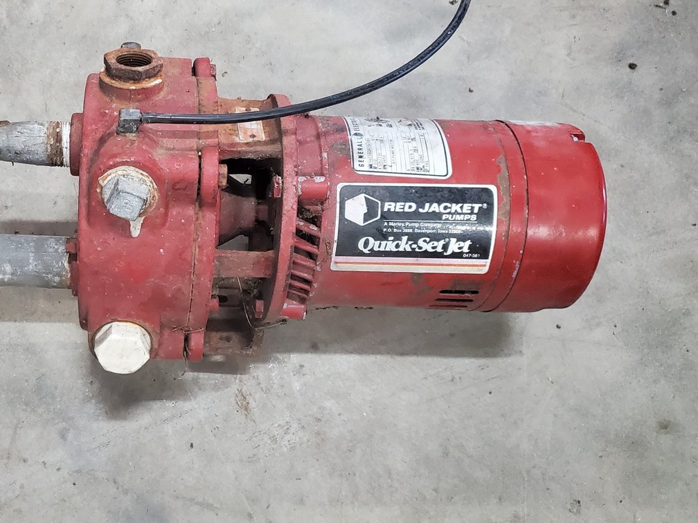 Lot 203: Red Jacket pump