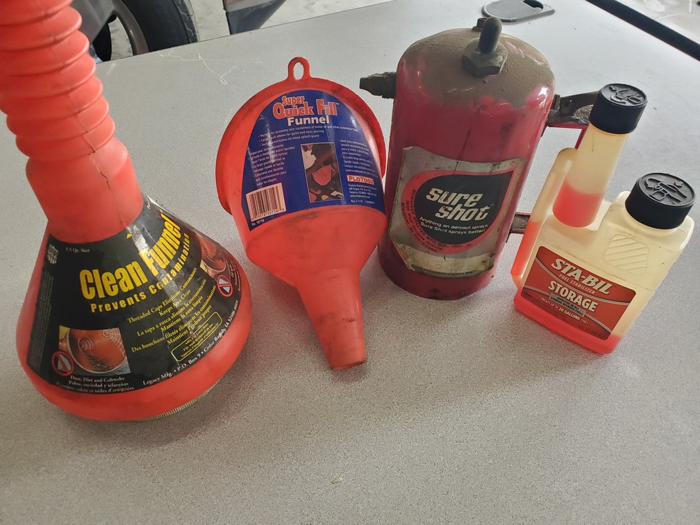 Lot 93: Sure shot aerosol spray can and funnels