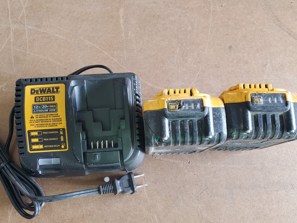 Lot 180: Dewalt batteries and new charger