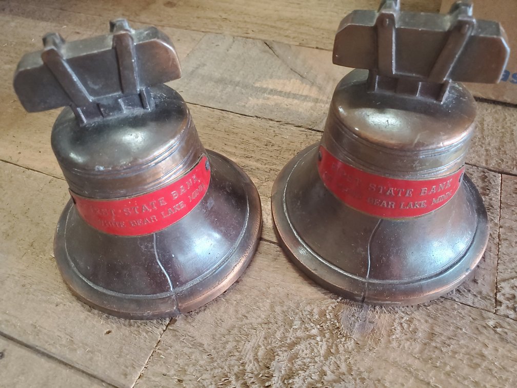 Lot 113: Metal bell coin bank