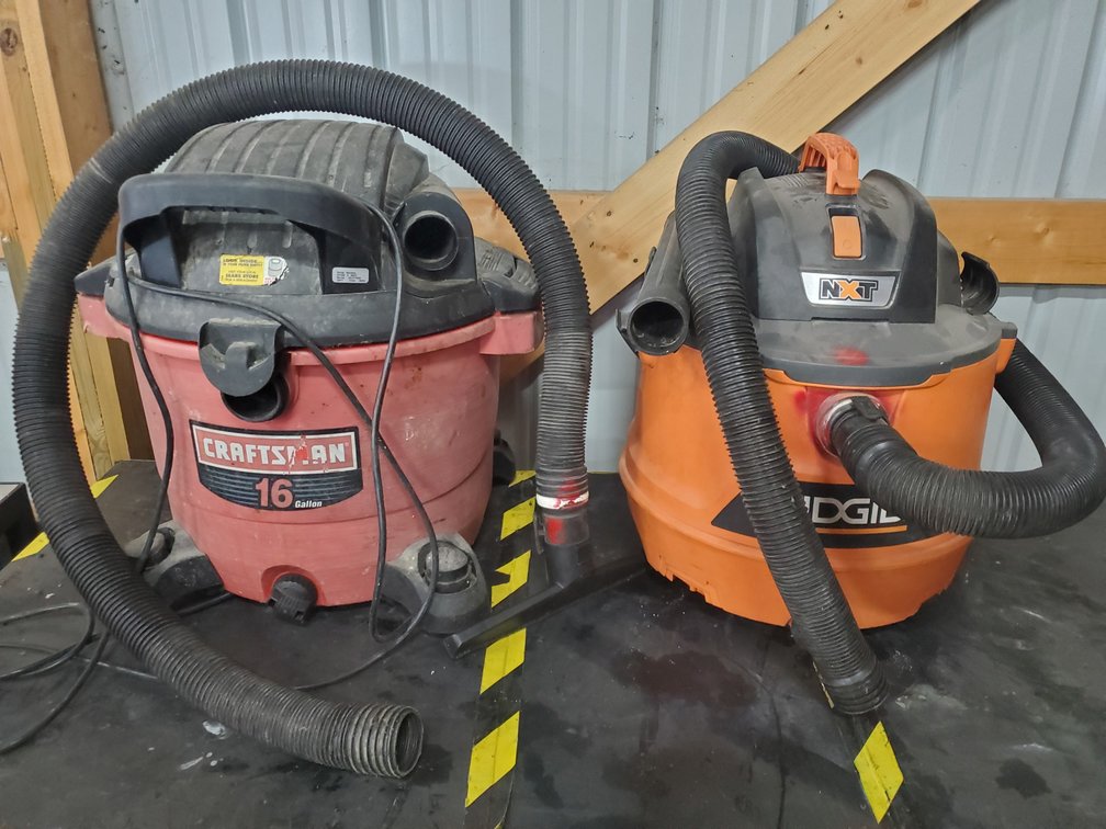 Lot 144: Pair of vacuums