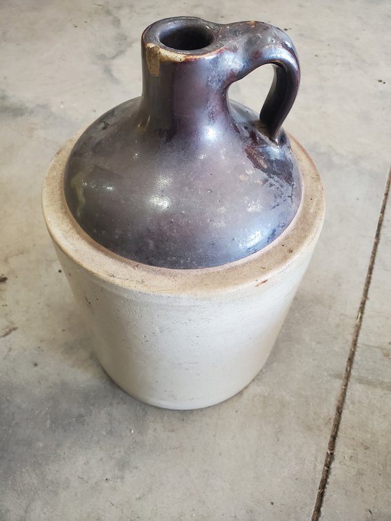 Lot 15: Vintage Moonshine jug/crock