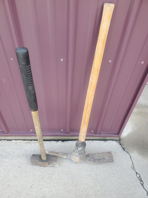 Lot 104: Sludge hammer and pick axe
