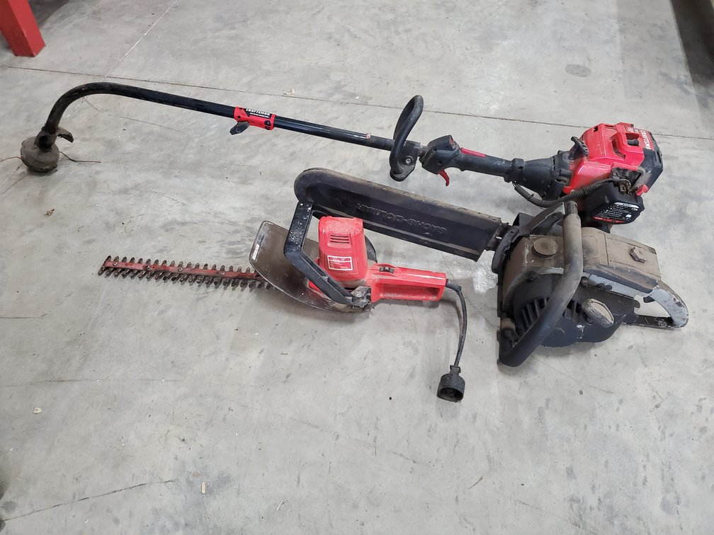 Lot 201: Chainsaw with Hedge and string trimmer