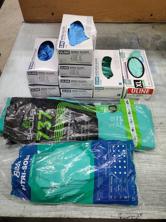 Lot 152: Gloves and suits