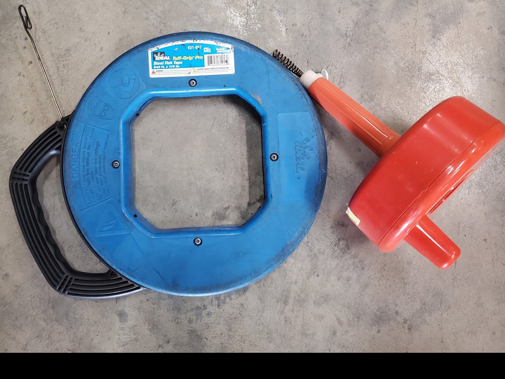 Lot 157: Steel fish tape and sewer snake