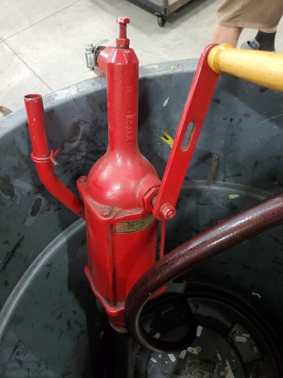 Lot 141: Tuthill Fill-Rite Hand Barrel Pump with Hose & Rubbermaid BRUTE Can
