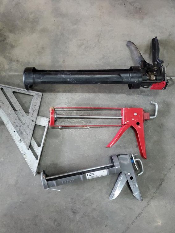 Lot 30: Group of Caulk Guns and Speed Squares
