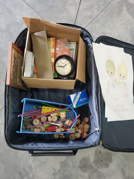 Lot 131: Rolling Suitcase With Mixed Household Contents