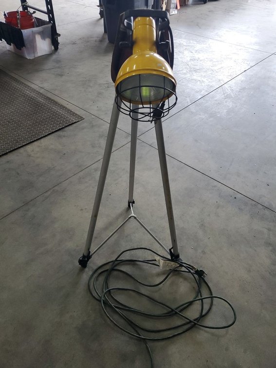 Lot 137: Industrial Tripod Work Light Yellow Metal Cage Guard Lamp Tested