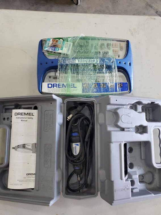 Lot 77: Dremel 300 Series Rotary Tool Kit w/ Case Manual & Accessories