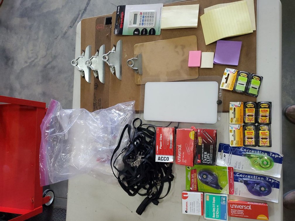 Lot 141: Box Lot of Office Supplies Clipboards Post-it Lanyards Calculator