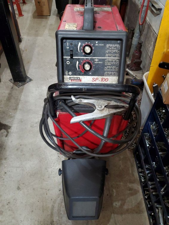 Lot 35: Lincoln Electric SP-100 MIG Welder w/ Cart & Jackson Helmet 115V