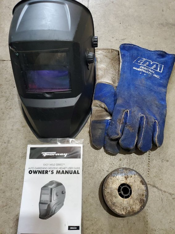 Lot 36: Forney Easy Weld Auto-Darkening Welding Helmet Gloves Wire Lot