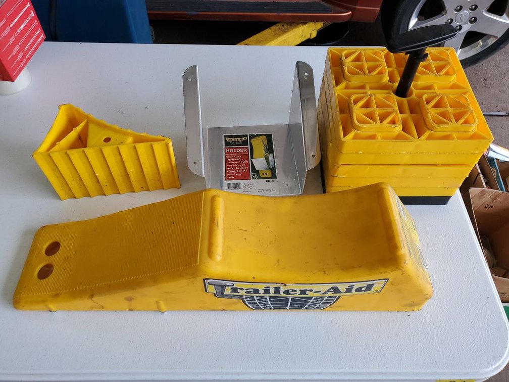 Lot 53: Trailer-Aid RV Trailer Leveling Ramp Chock Block Accessory Lot