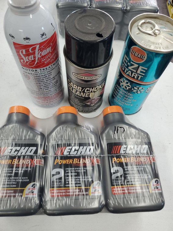 Lot 117: Assorted Small Engine Fluids Lot Echo Sea Foam Briggs & Lubaid