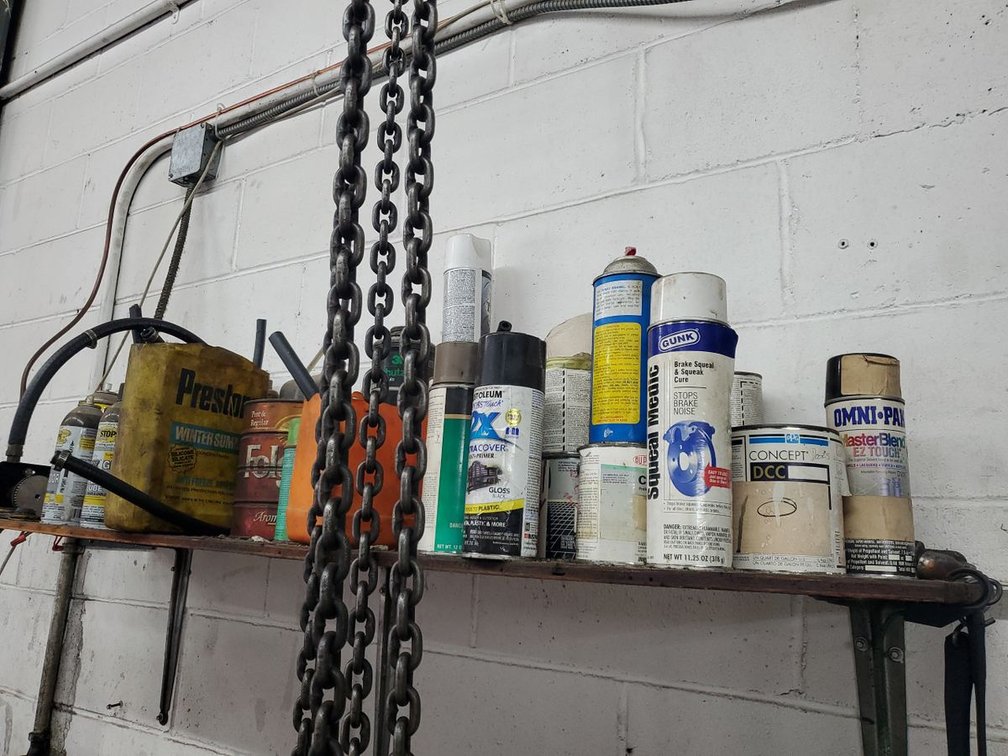 Lot 144: Box Lot of Assorted Automotive Fluids Spray Cans & Garage Supplies