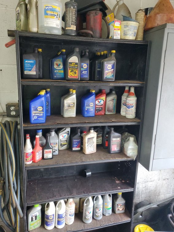 Lot 149: Lot of Assorted Motor Oil ATF Gear Oil Additives Shop Fluids
