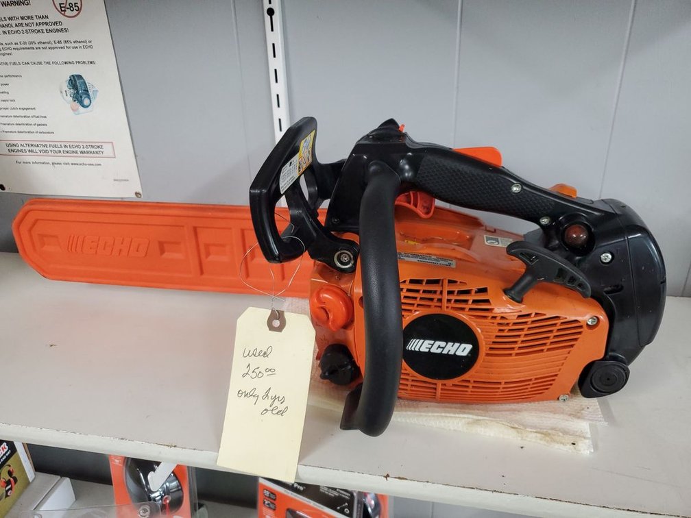 Lot 158: Echo Top-Handle Gas Chainsaw 35.8cc Orange Used Good Condition
