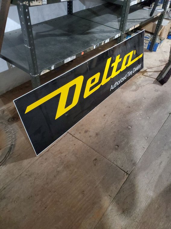 Lot 217L: Delta Tire Dealer Sign & Toyo Tires Promo Banner Advertising Lot