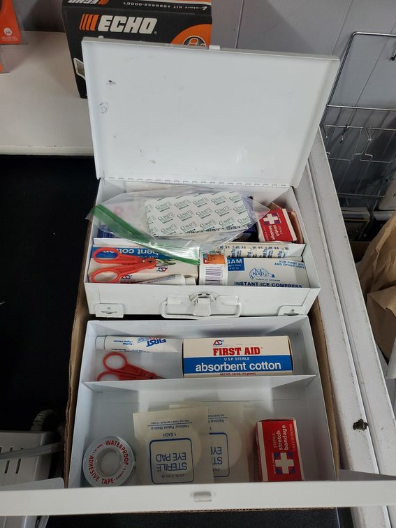 Lot 239: Metal First Aid Cabinet w/ Assorted Bandages Supplies & Trays