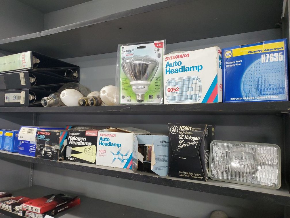 Lot 244: Assorted Sylvania GE NAPA Sealed Beam Headlamps & Bulbs NOS