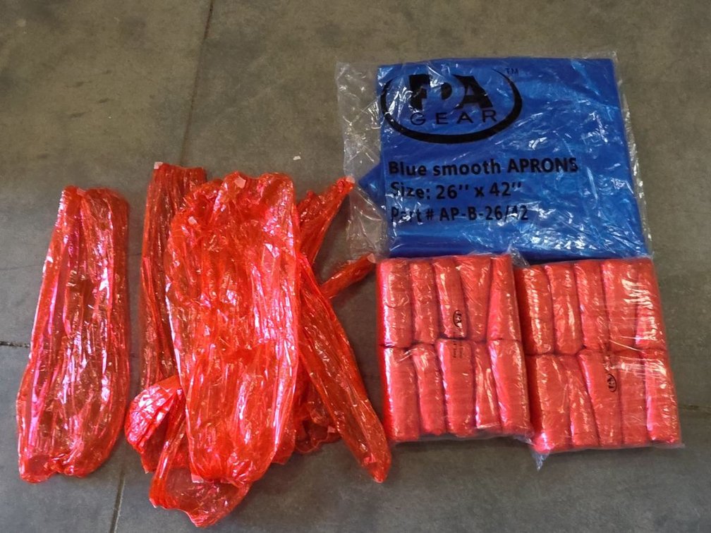 TPA Gear Disposable Aprons & Red Sleeve Protectors(110 sleeves in this lot)
