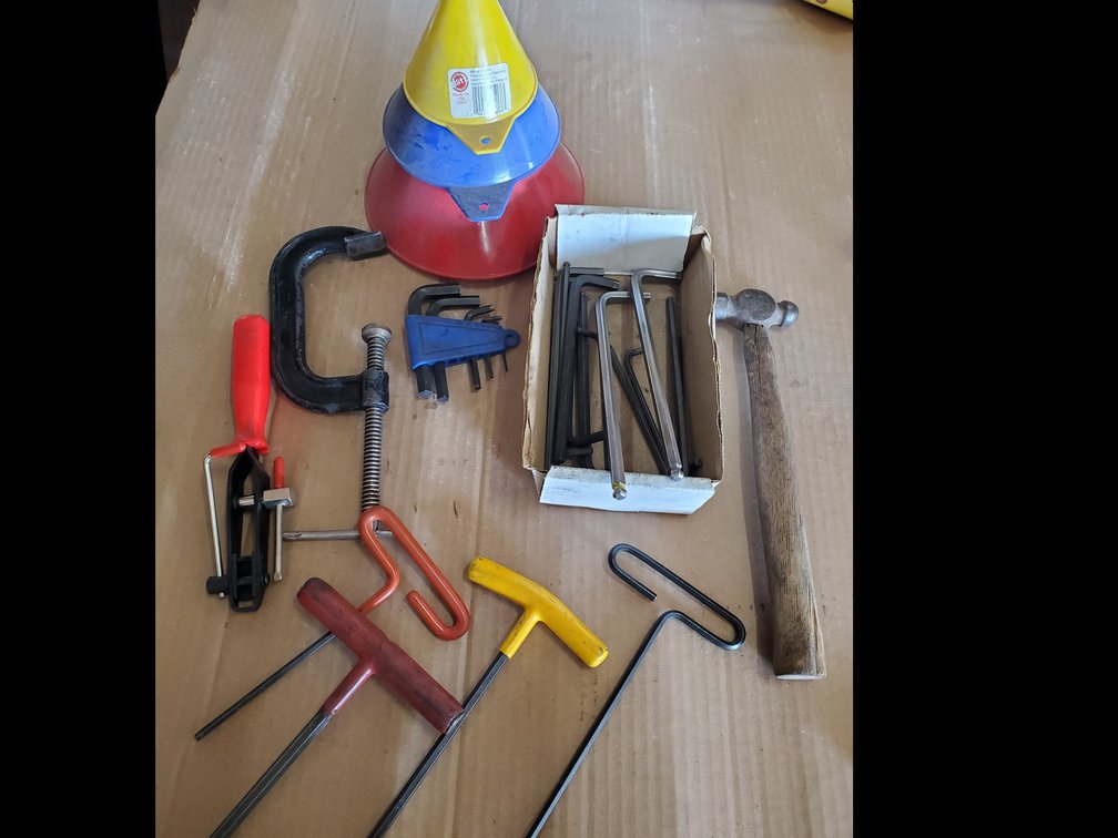 Lot 36: Misc hand tools and new funnels