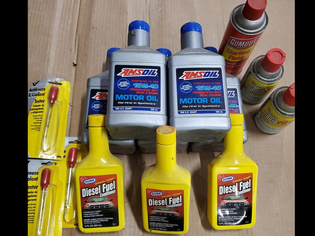 Lot 43: AMS oil 15w-40, starting fluid 