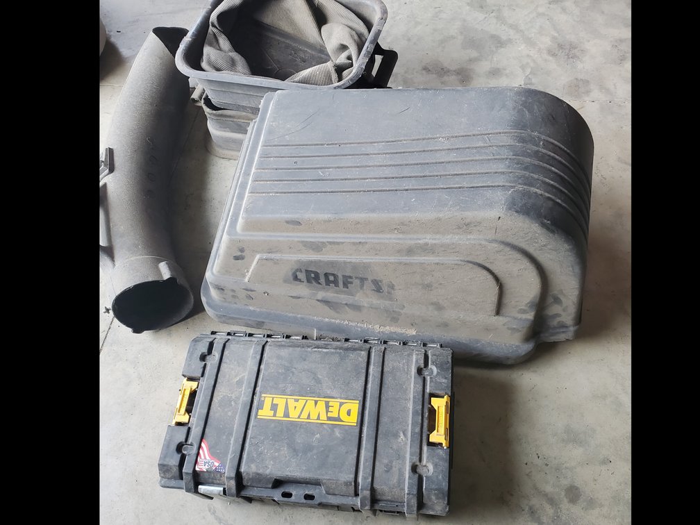 Lot 115: Craftsman Lawnmower bagger/dewalt storage case