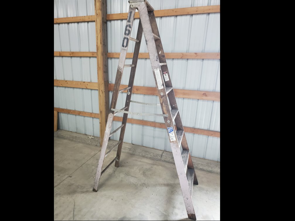 Lot 127: Werner 8ft wood ladder