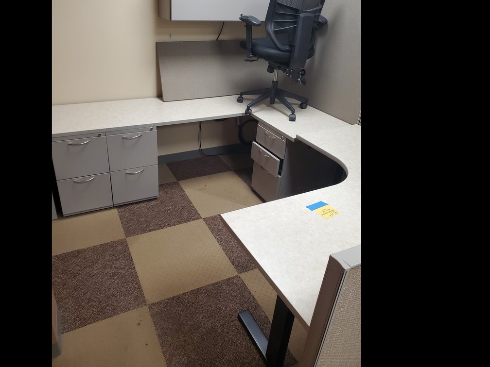 Lot 102: Cubicle corner with desks,chair and upper cabinet 