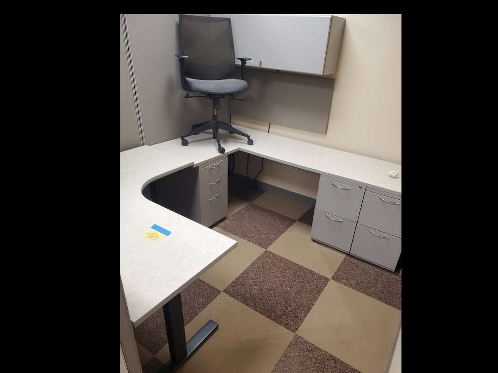 Lot 103: corner cubicle with desk and chair