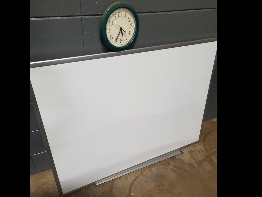 Lot 38: White Board and Clock