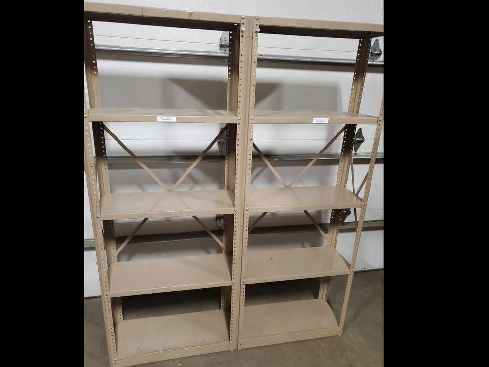 Lot 107: Metal storage shelf