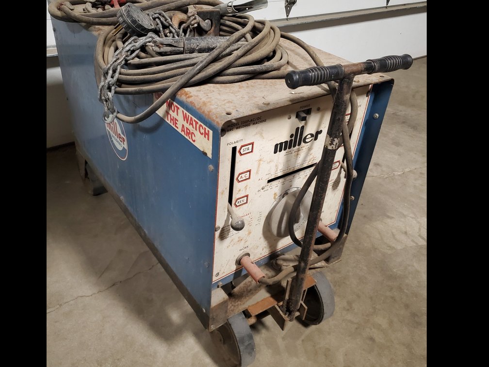 Lot 80: Miller arc welder on wheels