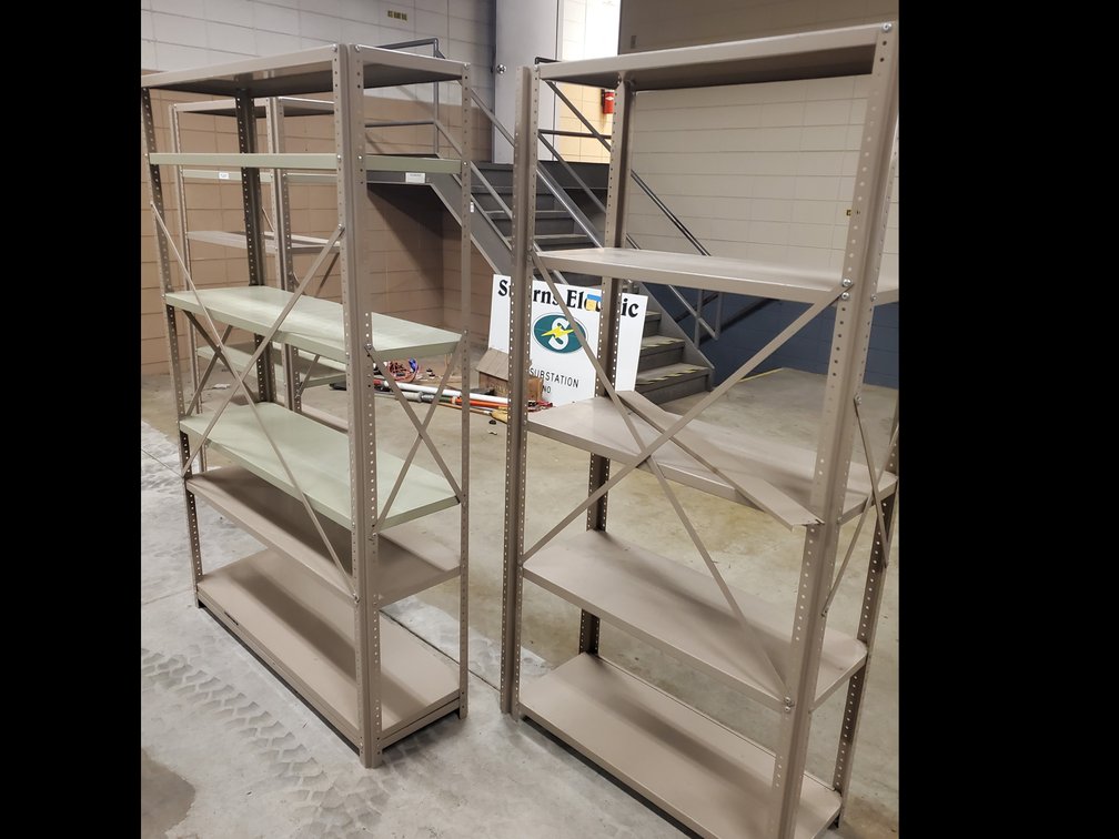 Lot 123: Metal free standing shelves 