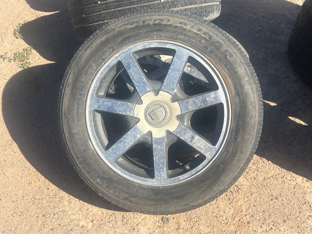 18” Cadillac rims with tires